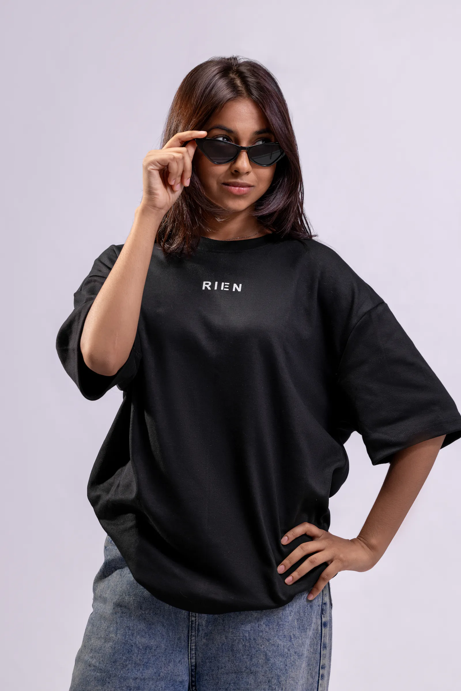 Defining The Future Oversized Tee Unisex in black, women's front fit